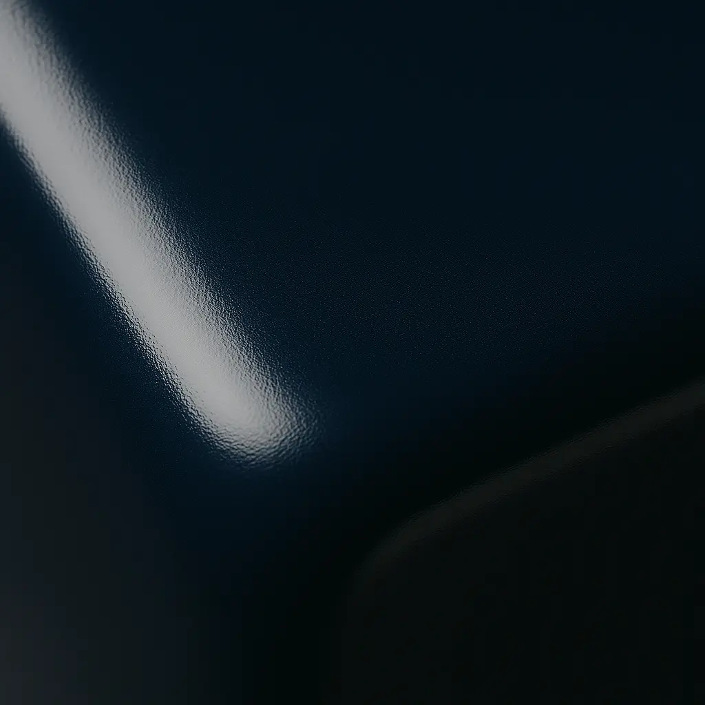 Extreme close-up of a glossy blue powder coated metal surface, emphasizing the high-quality finish and durability as key advantages of powder coating.